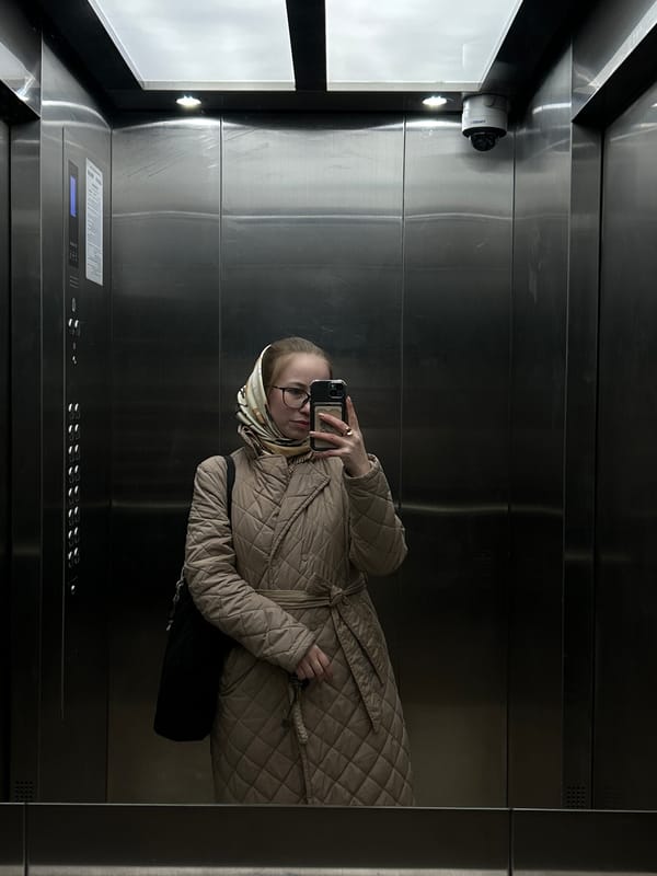 Saint Petersburg residents document elevator selfie, floral still life