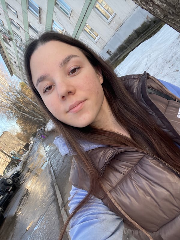 Women take selfies across snowy Chaikovsky, Russia streets
