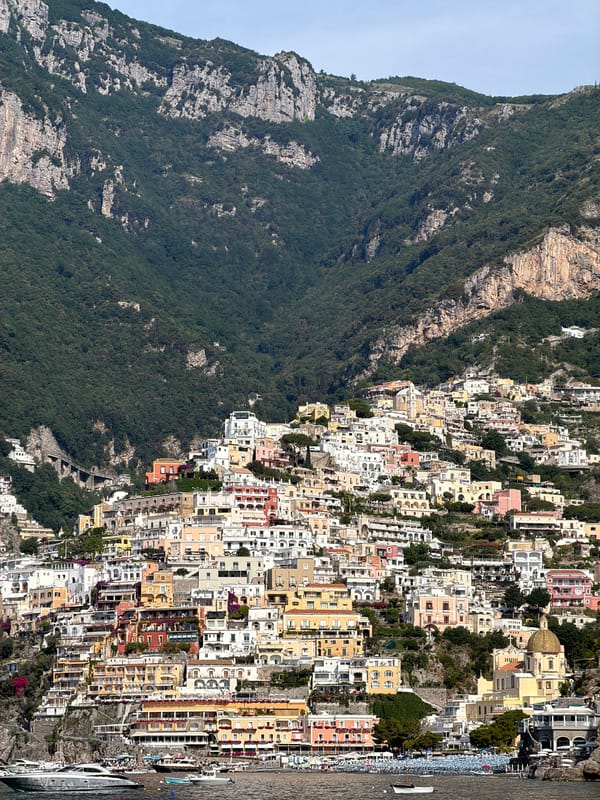 Morning boat tour captures scenic Amalfi Coast views near Positano