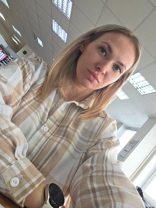Woman takes selfie indoors in Chaikovsky, Russia