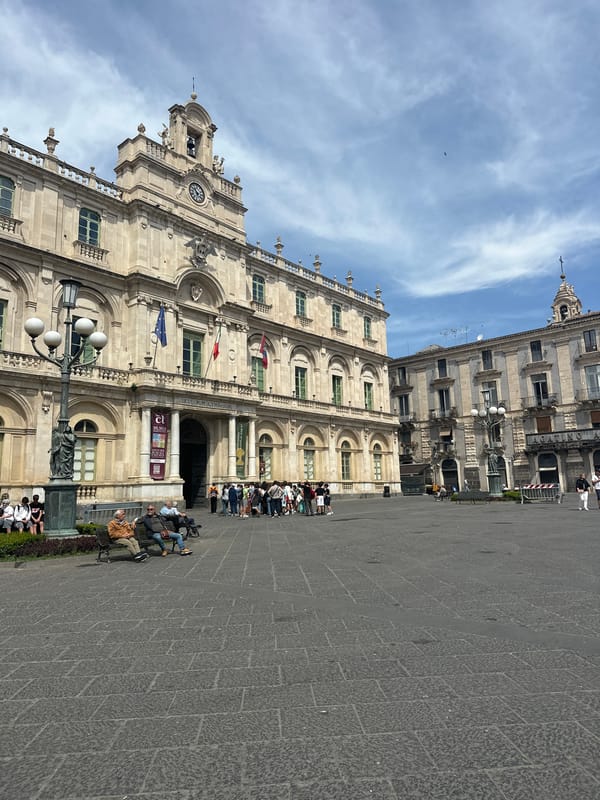 Morning street life documented across central Catania, Italy