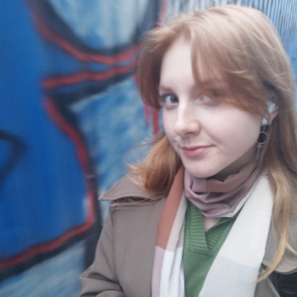 Portrait and Lenin statue photographed in Yekaterinburg