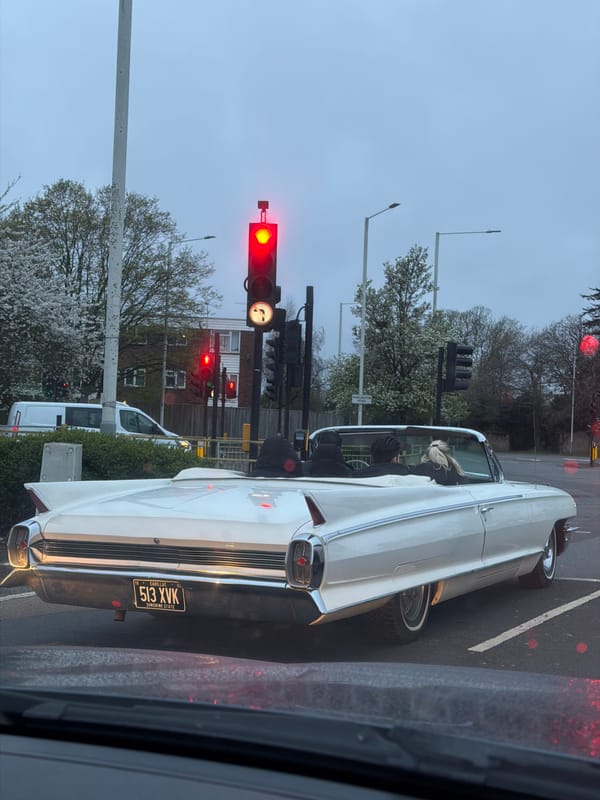 Vintage 1962 Cadillac convertible spotted at London traffic light