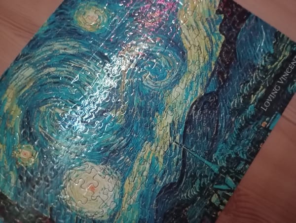 Person completes multiple jigsaw puzzles during 31-minute evening session