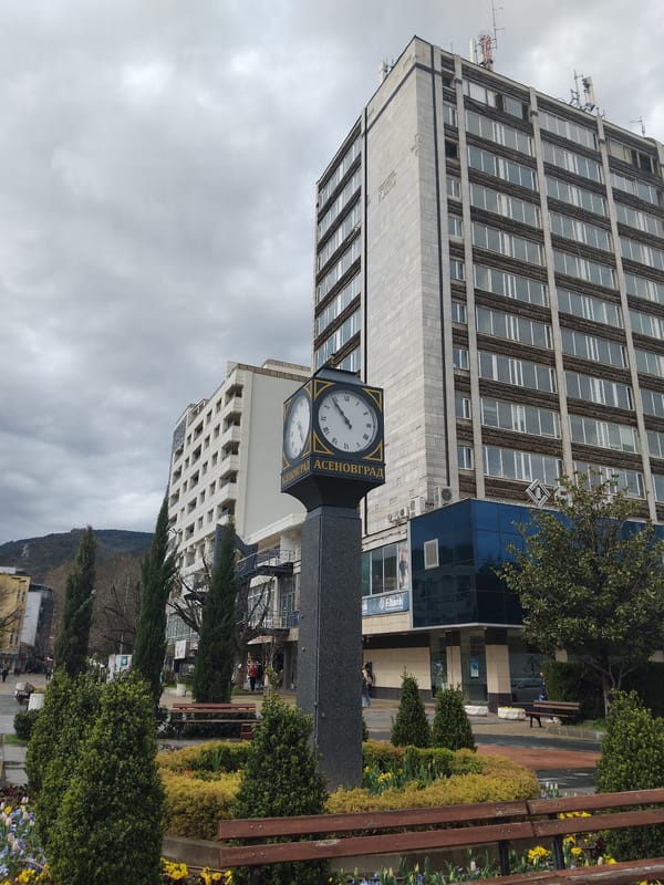 Office building and clock tower observed in Asenovgrad, Bulgaria