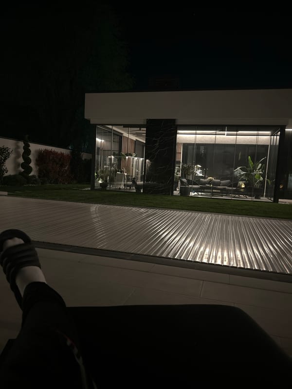 Modern glass building observed at night in Plovdiv