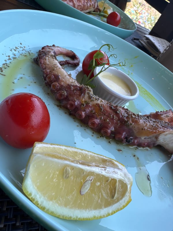 Seafood plates and a crowded beach day in Primorsko