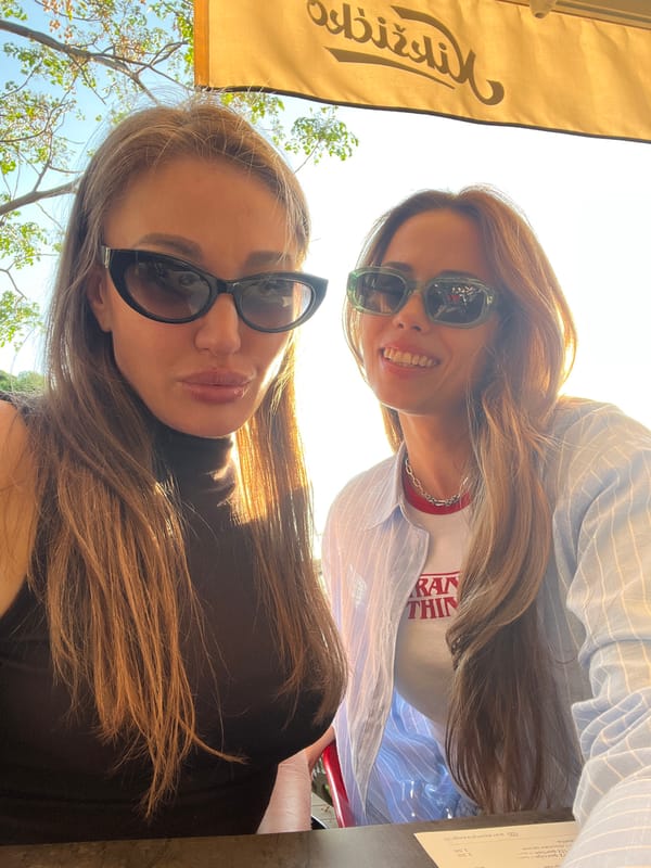 Women photographed at outdoor cafe in Bar, Montenegro