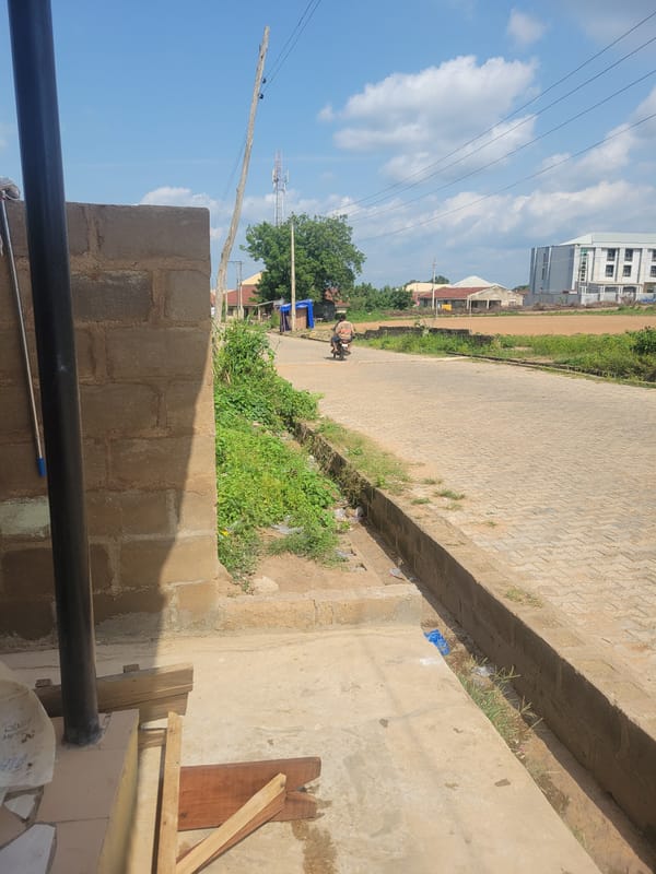 Street and building scenes from a sunny afternoon in Ogbomosho