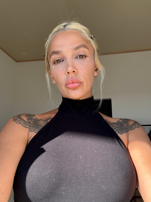Blonde woman with tattoos documented in Kuta Selatan scenes
