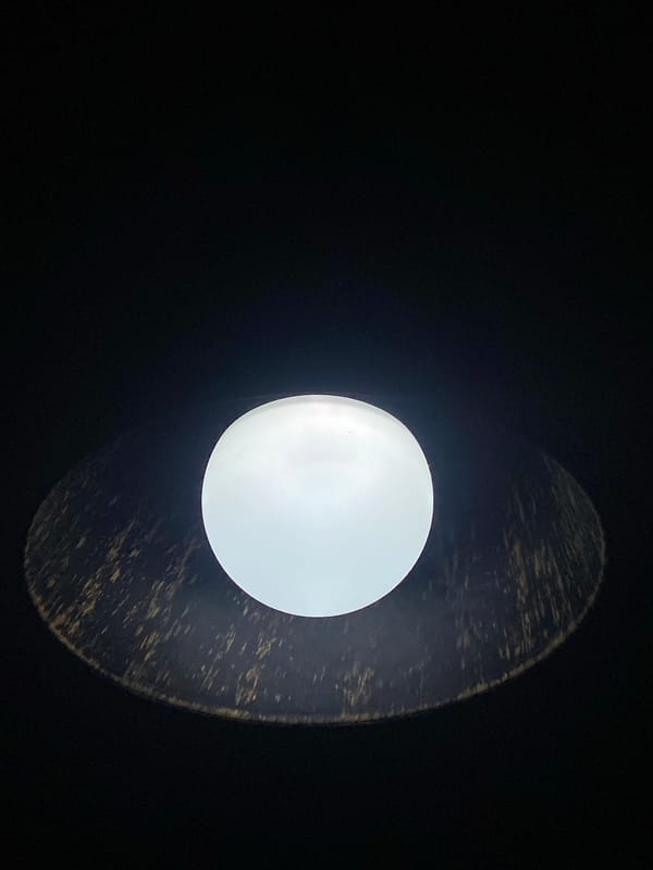 Light bulb fixture documented in Puebla home