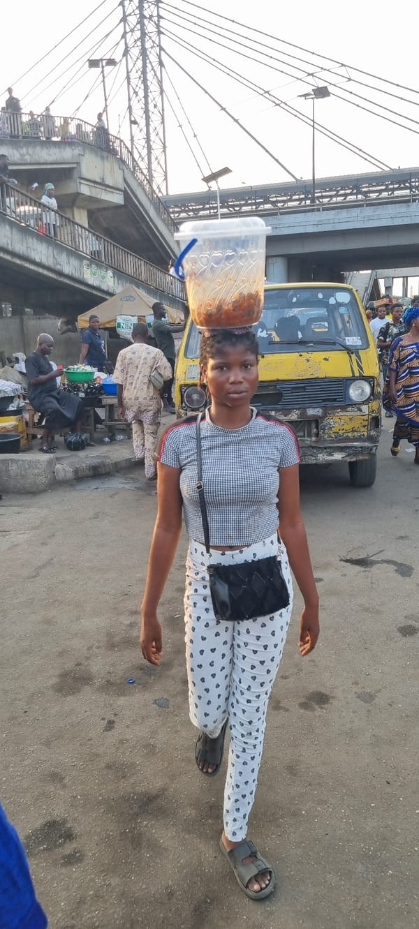 Urban life documented around Lagos transportation infrastructure