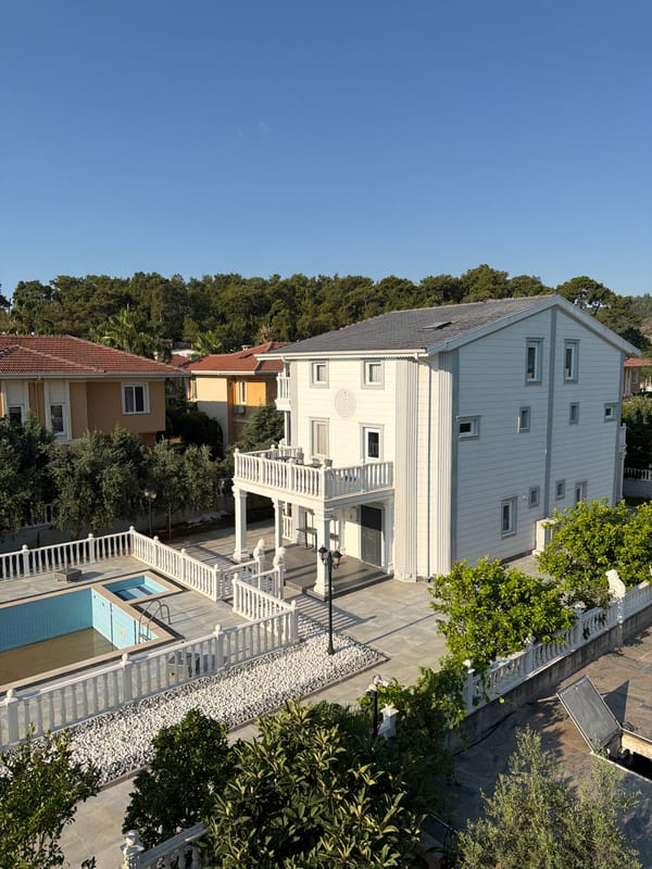 Modern villa with pool and mountain backdrop, multiple angles