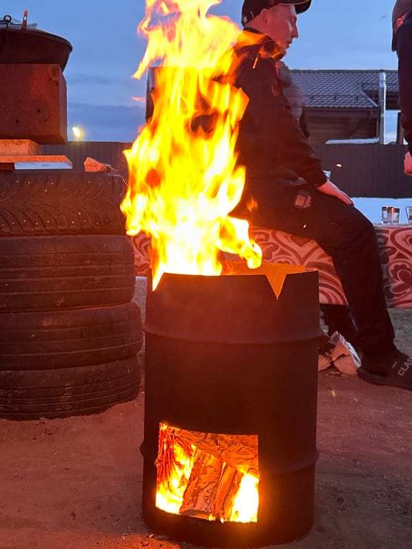 Outdoor barbecue gathering with traditional Russian food in Noviy