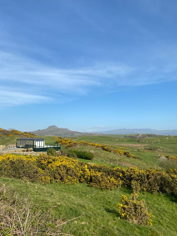 Coastal scenes documented in Criccieth, UK during afternoon