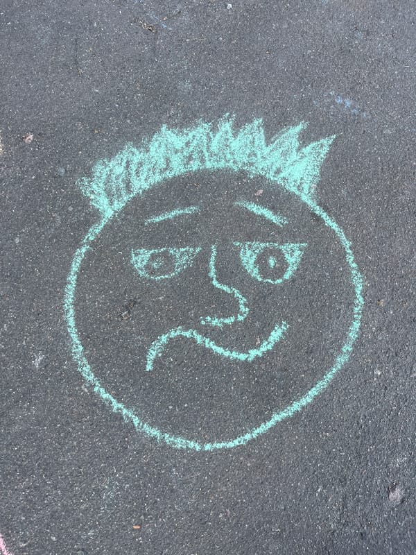 Chalk art and quiet scenes from a Kyiv afternoon