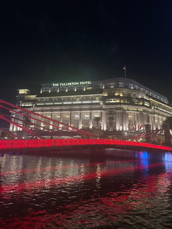 Singapore's riverside skyline at night, Fullerton and beyond