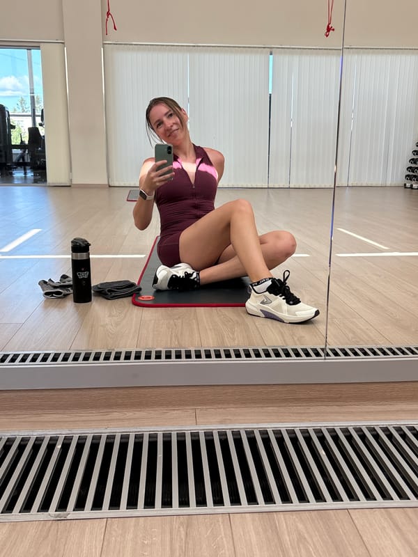 Gym session in Petrozavodsk: mat setup and dumbbell rack