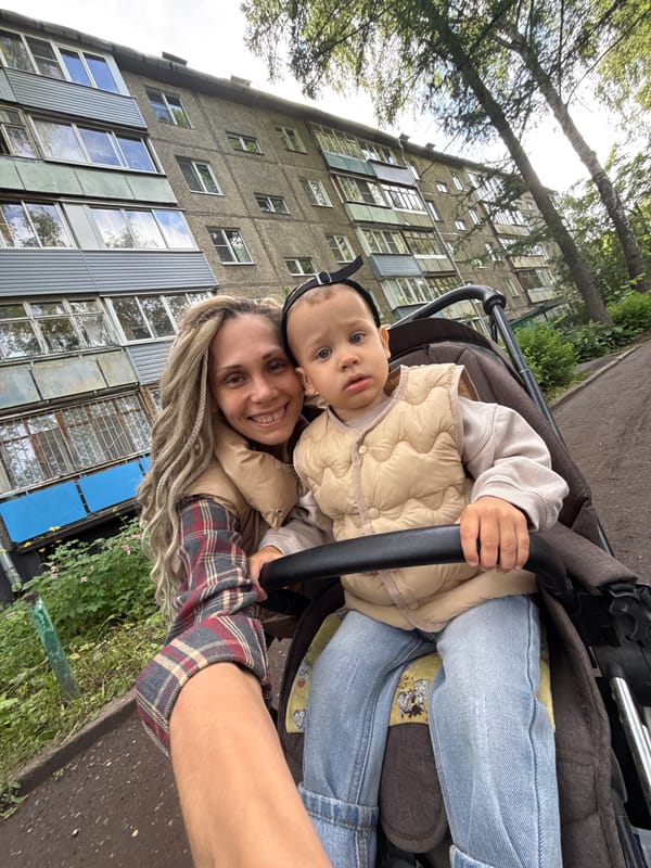 Mother and child capture selfie moment in Rusanovo