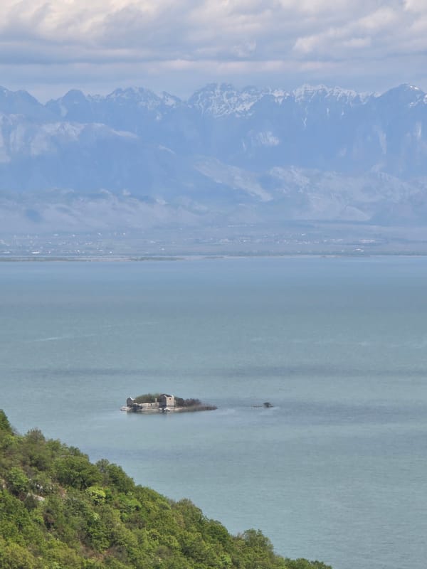 Visitor documents Skadar Lake views near Godinje, Montenegro