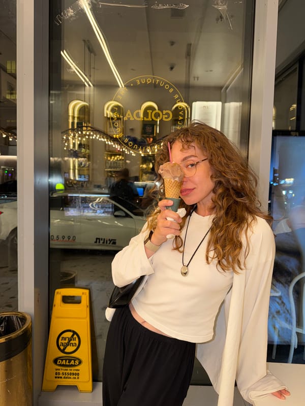 Ice cream moment outside a Tel Aviv shop window