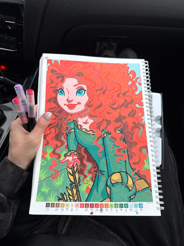 Person works on Disney Merida coloring page in Russia