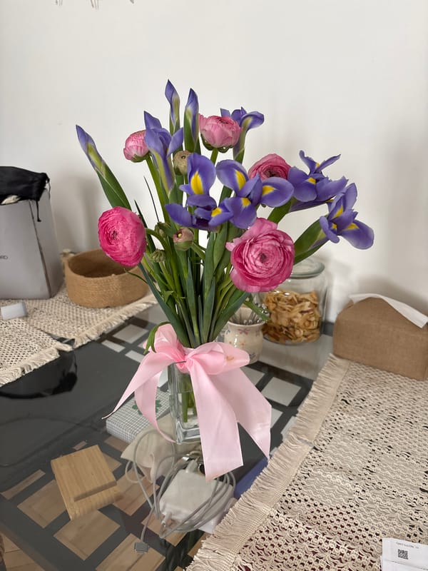 Flower bouquet observed on glass table in Moscow
