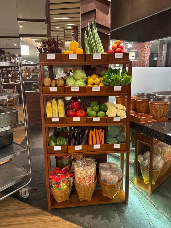 Evening at a Bali resort: buffet spreads and Balinese art details