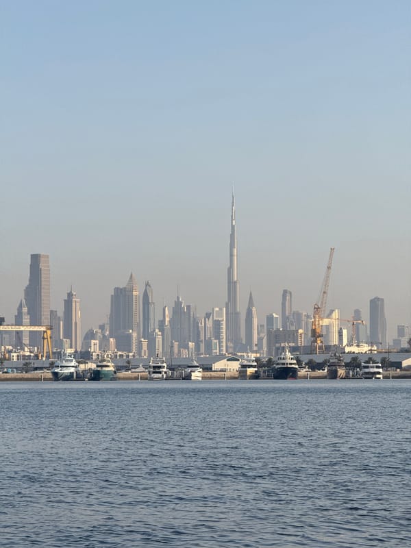 Hazy Dubai skyline captured featuring Burj Khalifa and waterfront