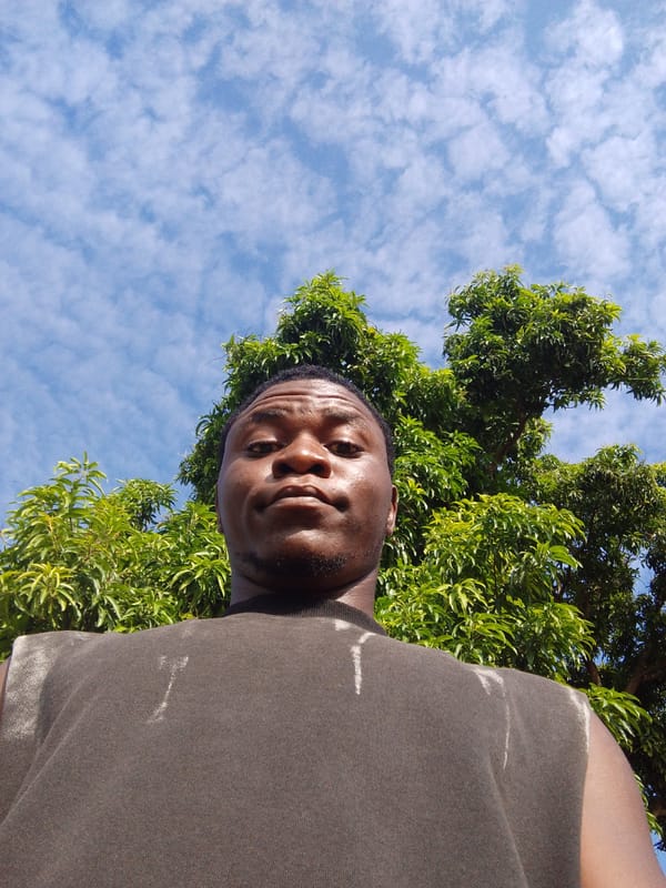 Young man documents rural Keffi landscape and construction activity