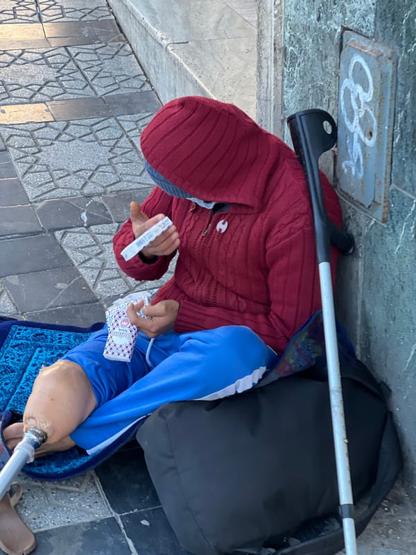 Daily life unfolds across Tangier's streets and markets