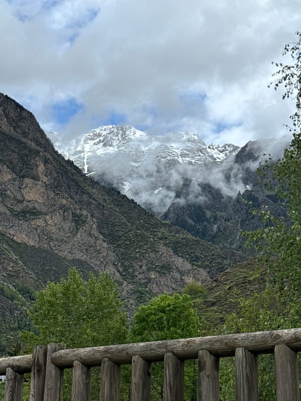Mountain landscape photographed from Benasque viewpoint amid cloudy conditions