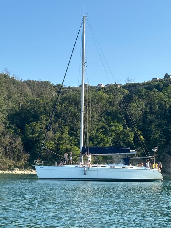 Lazy afternoon on the water near a lighthouse bay