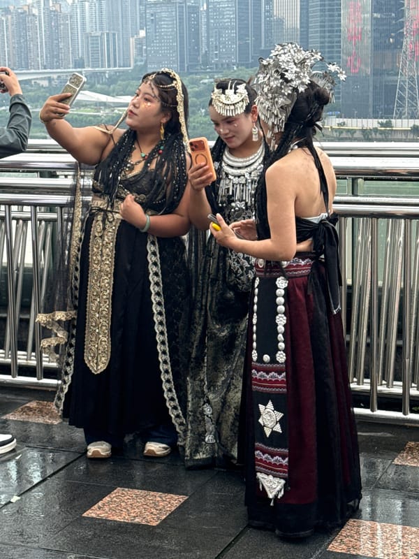 Chongqing's Yuzhong waterfront buzzing with tourists and traditional costume shoots