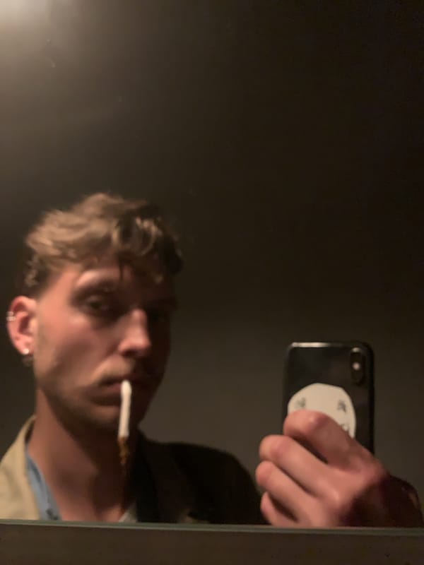 Four friends gather at Tel Aviv bar, capture moment