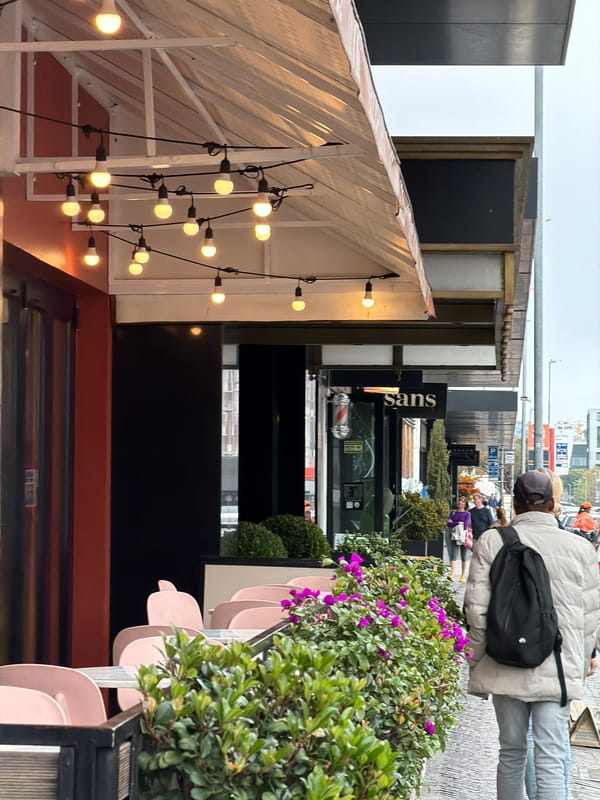 Shopper documents artisanal food market visit in Cape Town