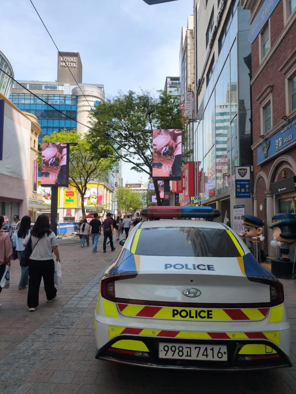 Early morning street life documented across Seoul's Myeongdong district