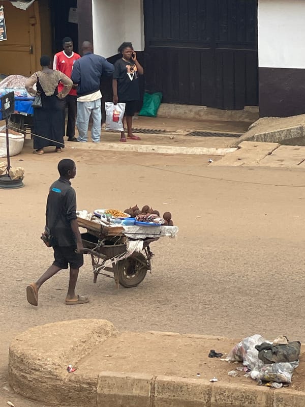 Outdoor market activity documented in unidentified urban area