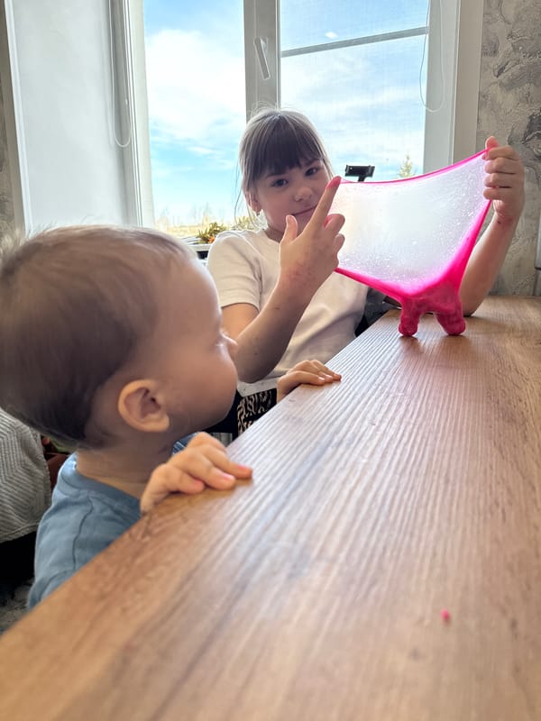Children play with pink slime in Fedorino, Russia