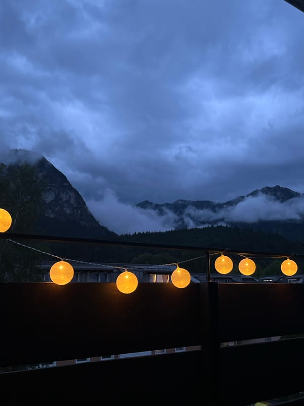 Balcony evening in Garmisch as clouds swallow the Alps