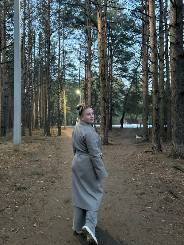 Adult and child enjoy forest walk in Chaikovsky