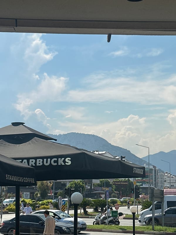 Starbucks outdoor seating observed in sunny Konyaaltı, Turkey