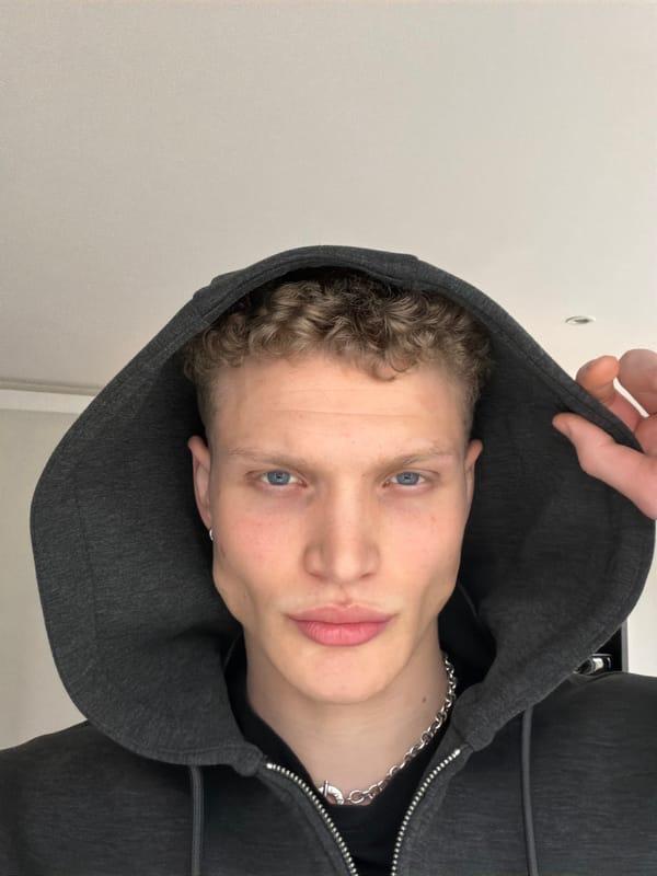 Two men captured in bathroom mirror selfie in London