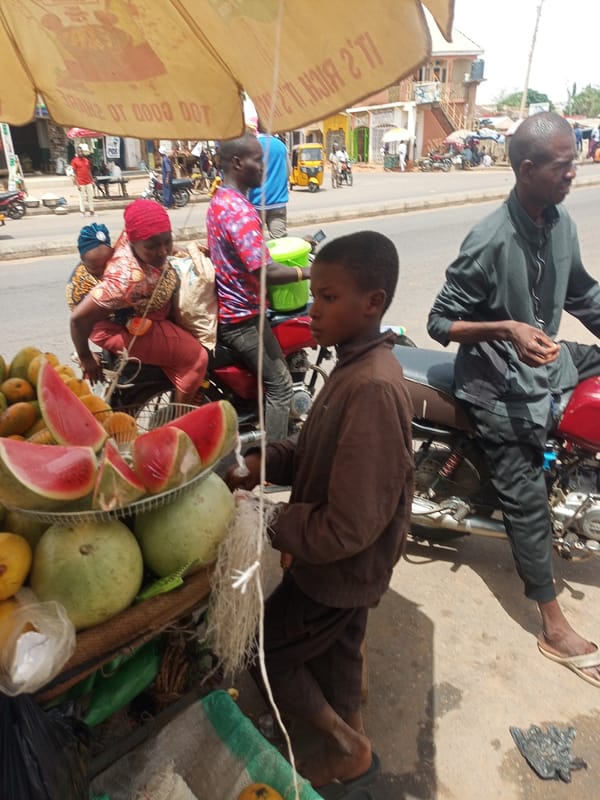 Open-air market bustles with vendors in Tempure, Nigeria
