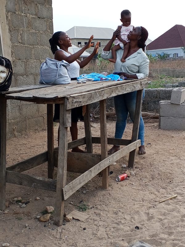 Daily life unfolds on Adonkolo streets Sunday afternoon