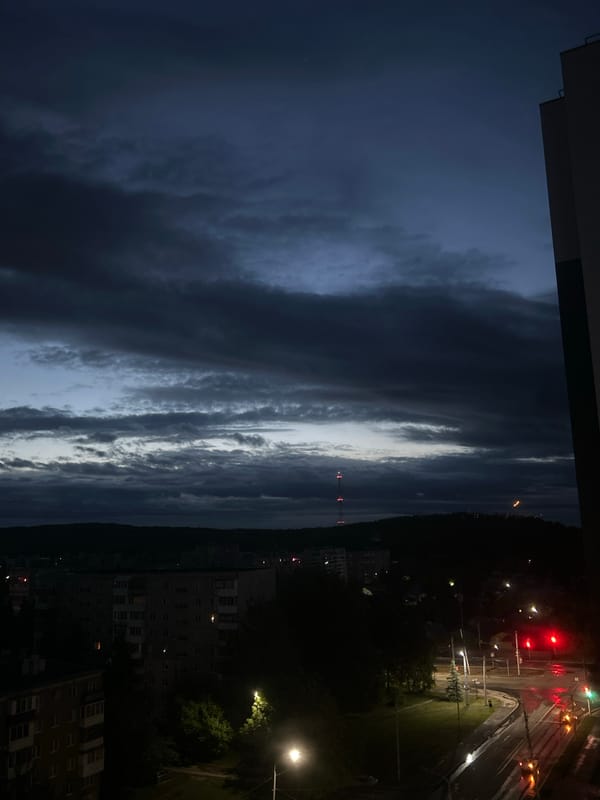 Nighttime cityscape views captured in Ufa, Russia under cloudy skies
