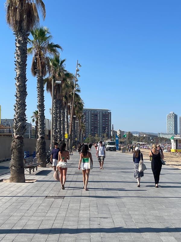 Packed summer afternoon at Barceloneta beach, Barcelona