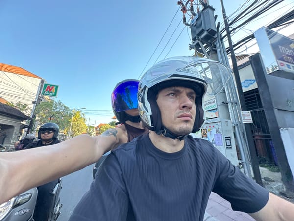 Motorcycle riders travel through North Kuta streets Sunday morning