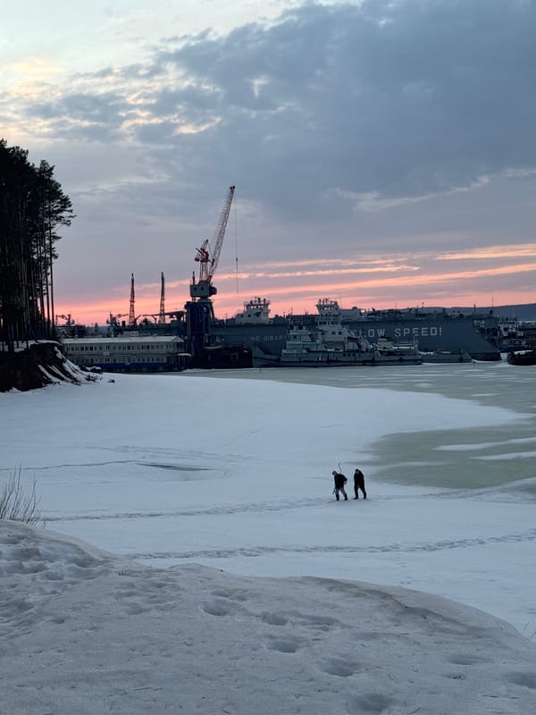 Winter twilight scenes documented across frozen Chaikovsky, Russia