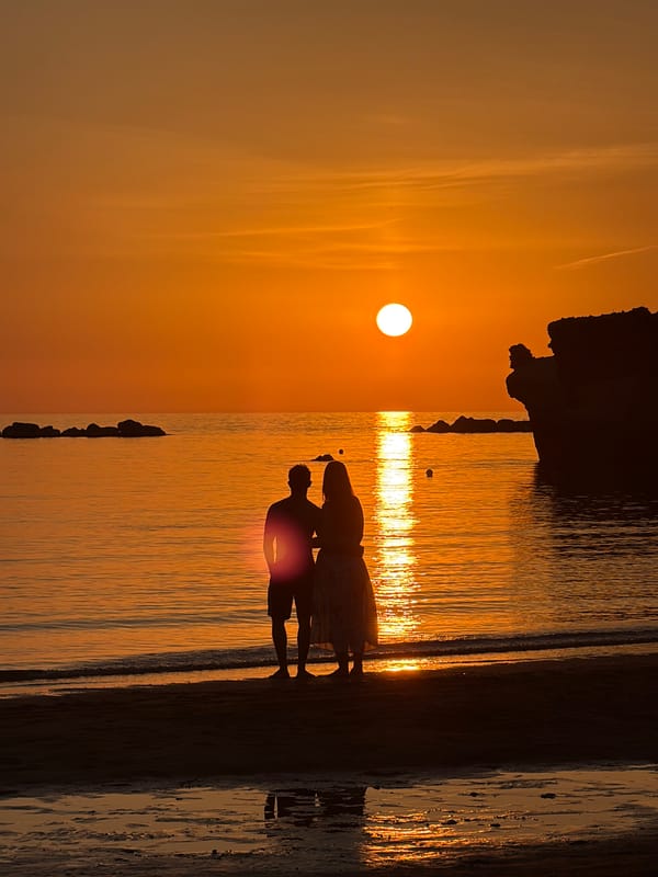 Sunset crowds gather on Anzio's beach along the Tyrrhenian Sea